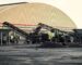 Electric wheel loader handling coal at a chemical plant yard