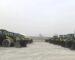 Row of green JGM electric wheel loaders staged at a Chinese chemical plant